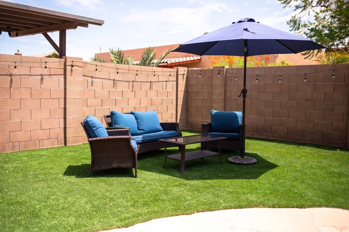Backyard patio seating at 7951 E 36th Place